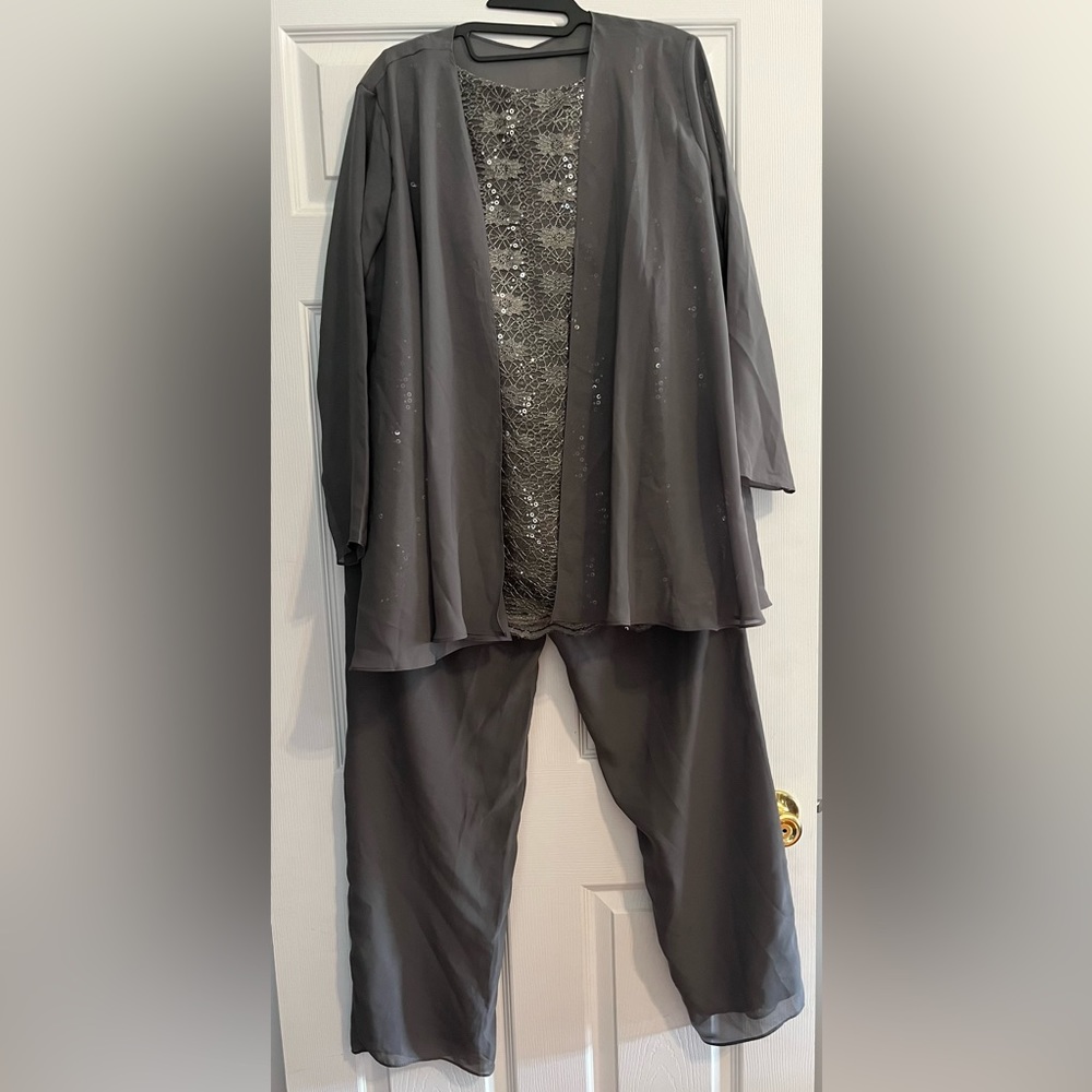 Woman’s 3-pc. Sequined lace pants suit with jacket